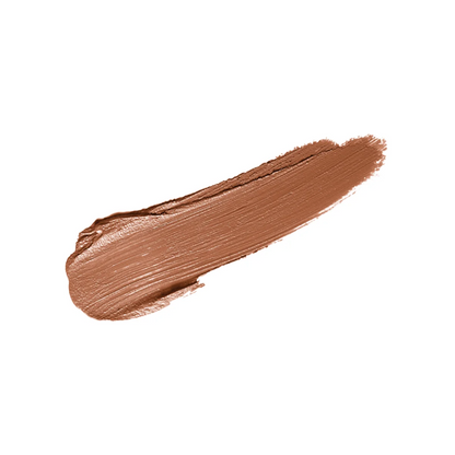 A textured swipe of warm medium brown cosmetic cream or liquid makeup on a solid white background.