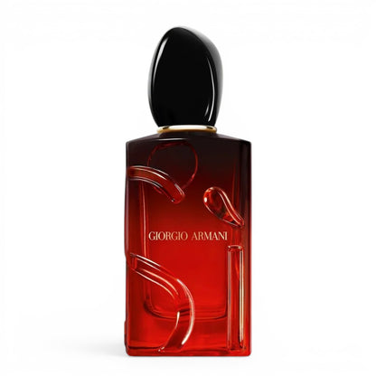 Red Giorgio Armani perfume bottle on a white background