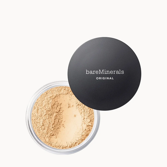 A clear round jar of bareMinerals Original loose powder foundation shown open with its black lid resting beside it on a clean white background.