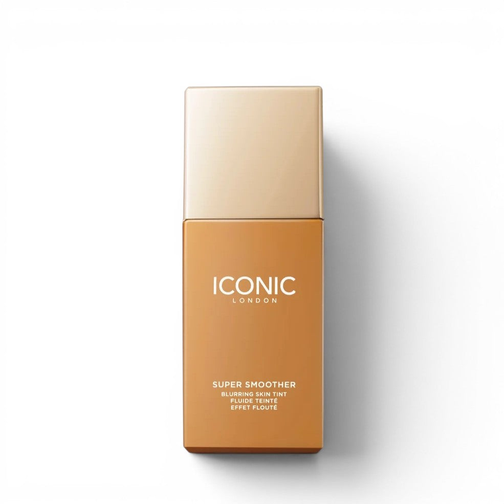 A bottle with 'Iconic London' foundation  in golden tan on a white background