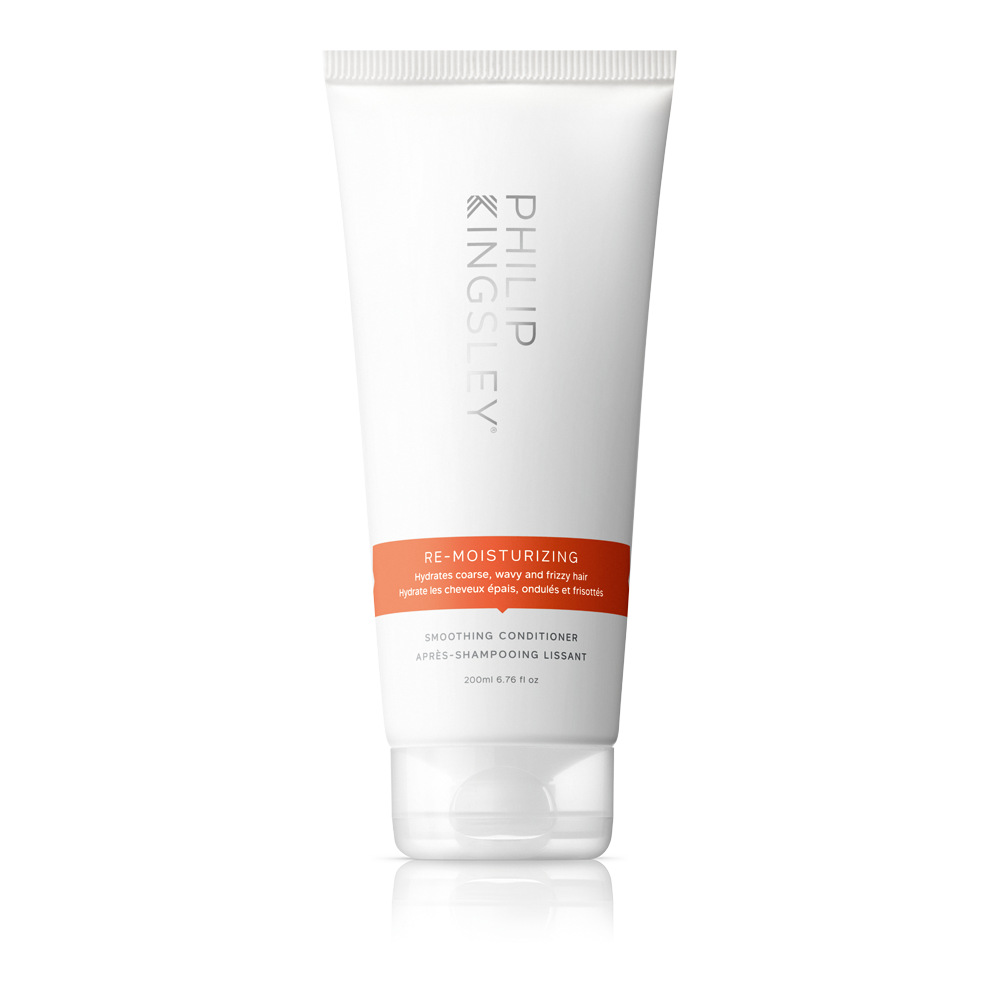 Tube of Philip Kingsley Re-Moisturizing Conditioner on a white background