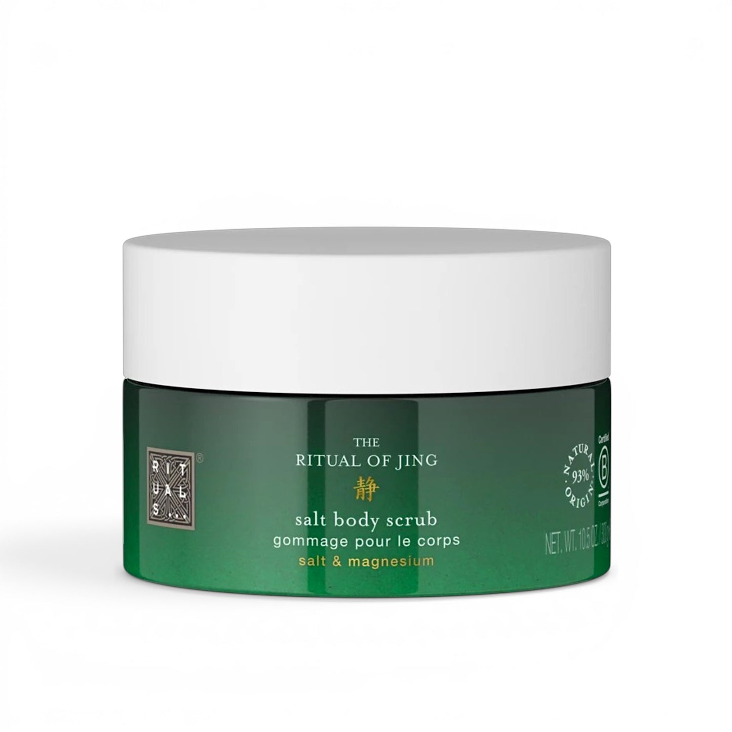 Green jar of salt body exfoliating scrub with white lid on a white background