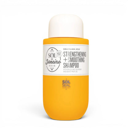 Shampoo bottle with yellow body and white label on a white background